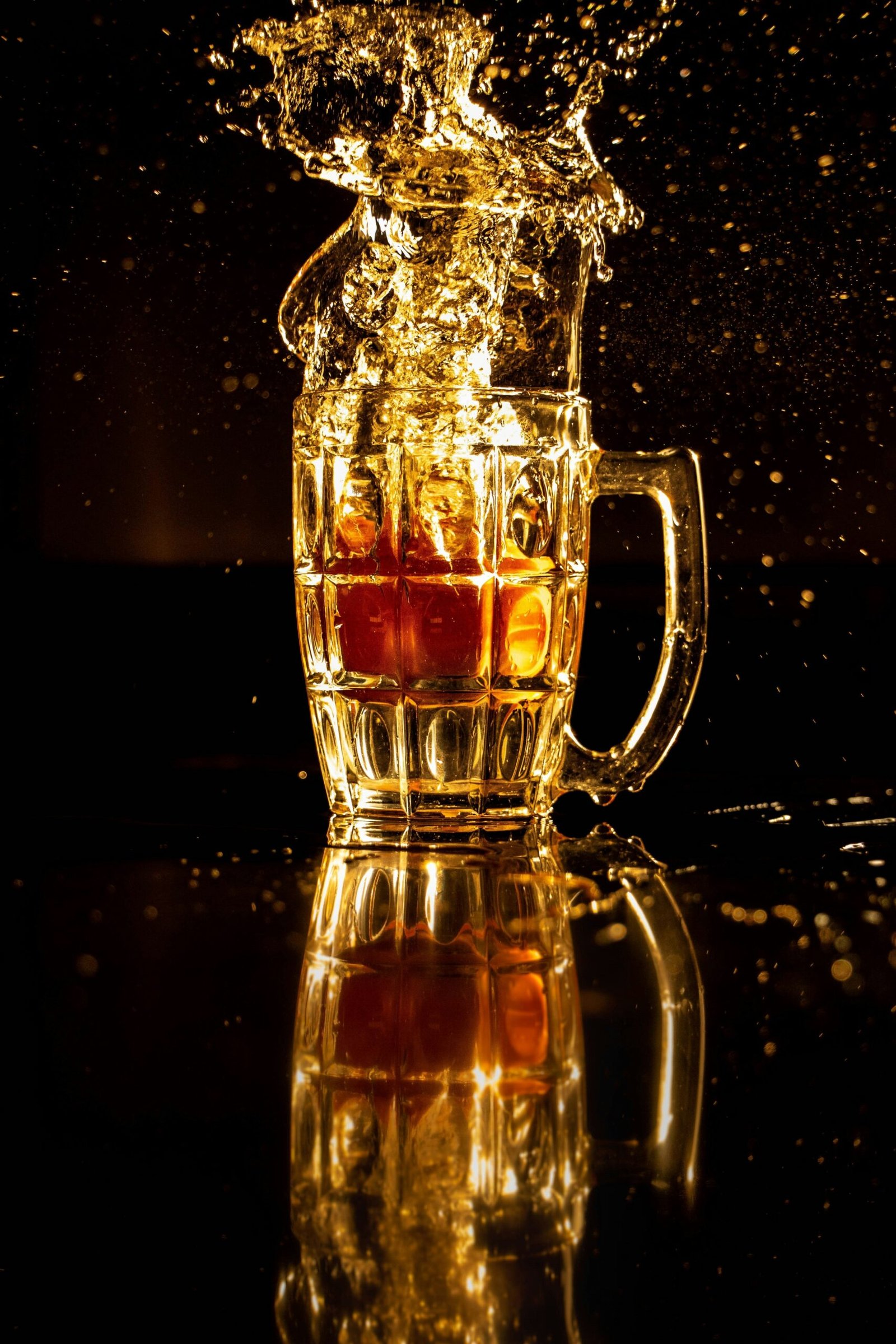 clear glass mug with brown liquid